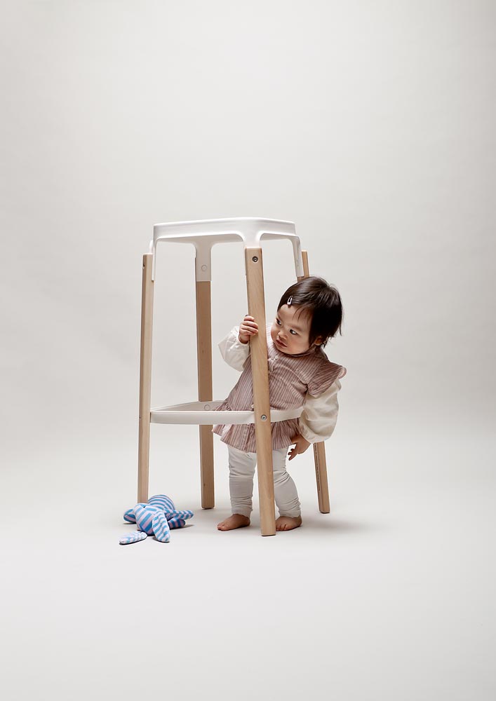 toddler with a bar stool