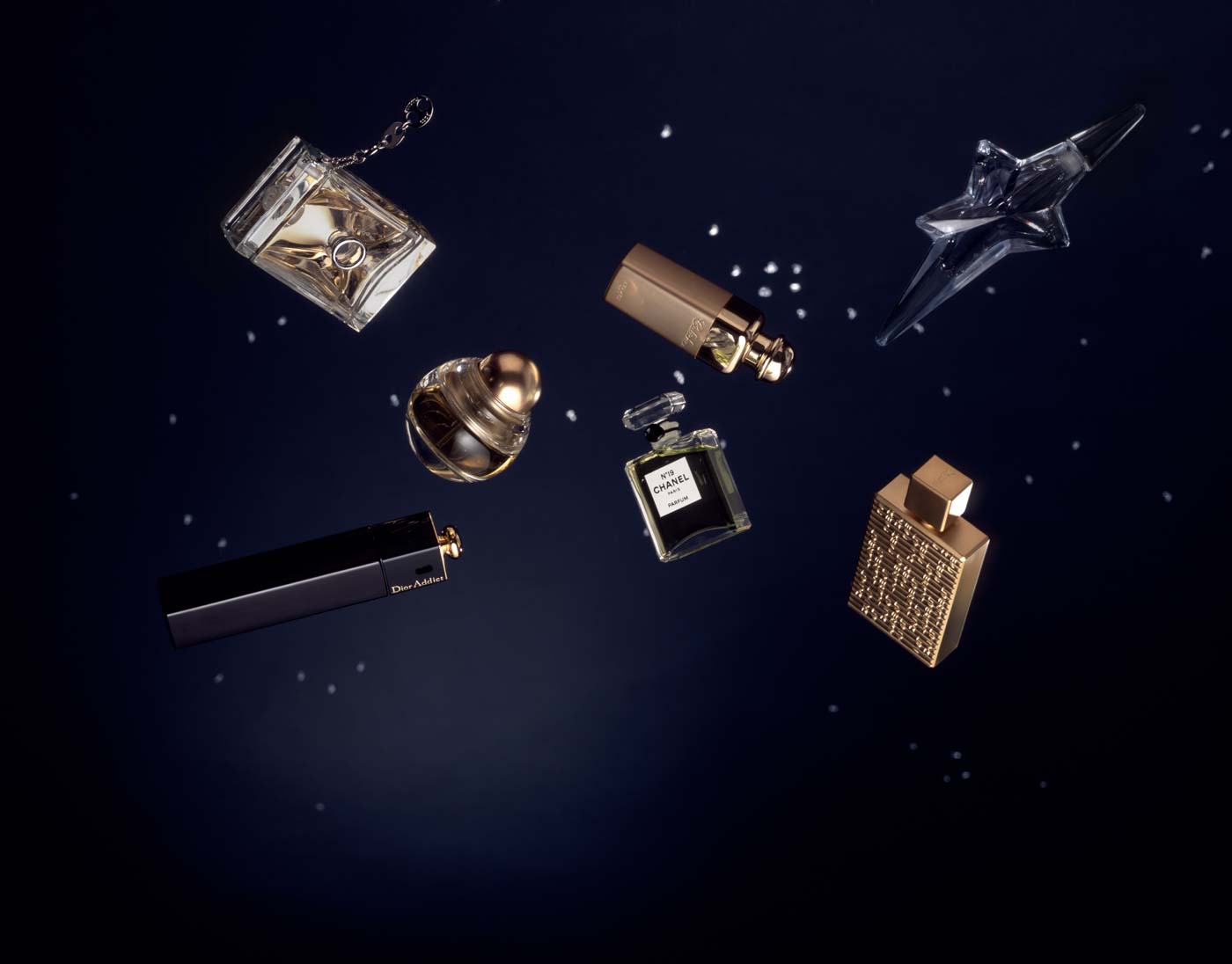 perfume bottles with star background